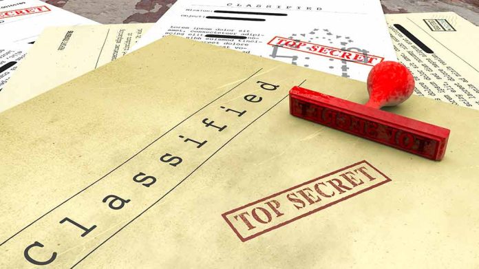 1099380299 featured image Classified documents with top secret stamps and stamp