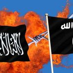 Two black flags with Arabic writing flames background