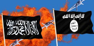Two black flags with Arabic writing flames background