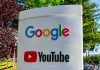 Google and YouTube sign with trees in background