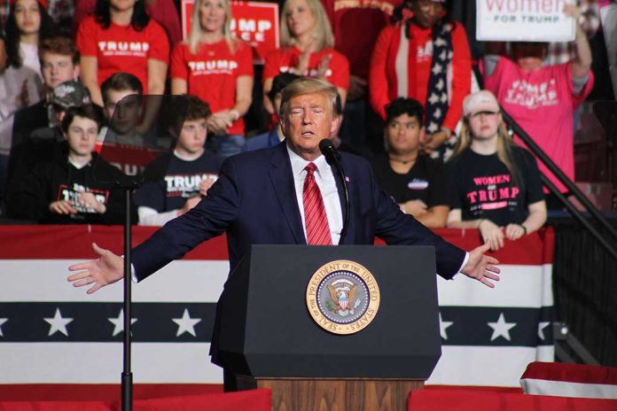 1662925921 featured image Person speaking at podium with crowd behind them