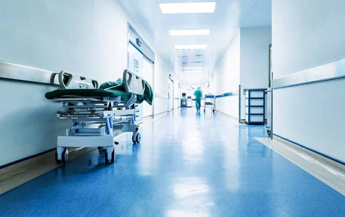 1723539229 featured image Hospital hallway with a stretcher and medical staff