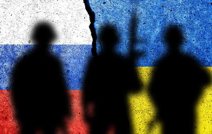 2095910923 featured image Silhouettes against split Russian and Ukrainian flags