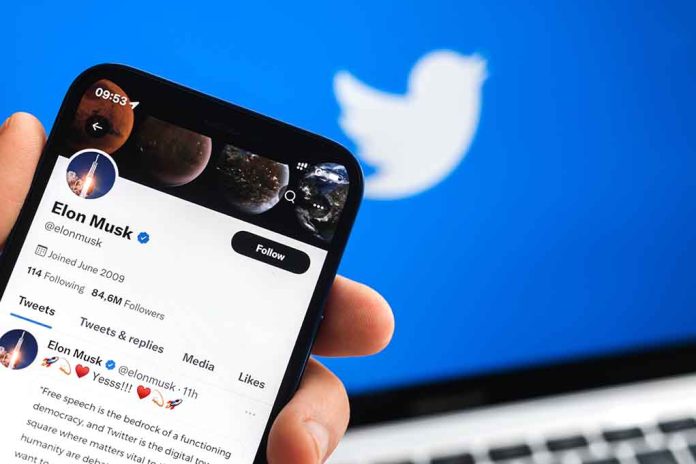 Twitter profile on smartphone screen with Twitter logo background