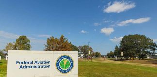Federal Aviation Administration sign on green lawn