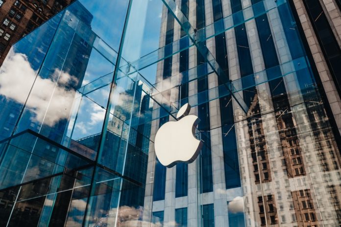 2374133657 featured image Apple store with glass facade and city reflections