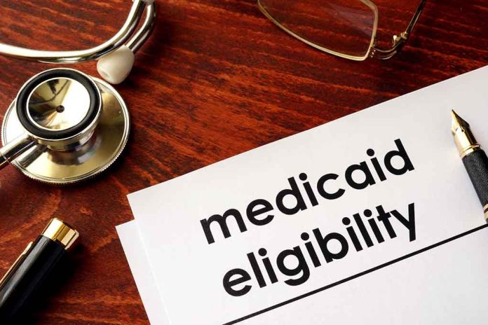 640488934 featured image Stethoscope pen document about Medicaid eligibility on table