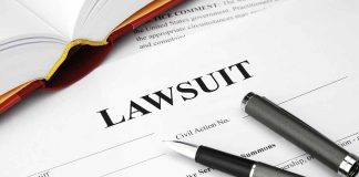 Legal document titled Lawsuit with pen and book