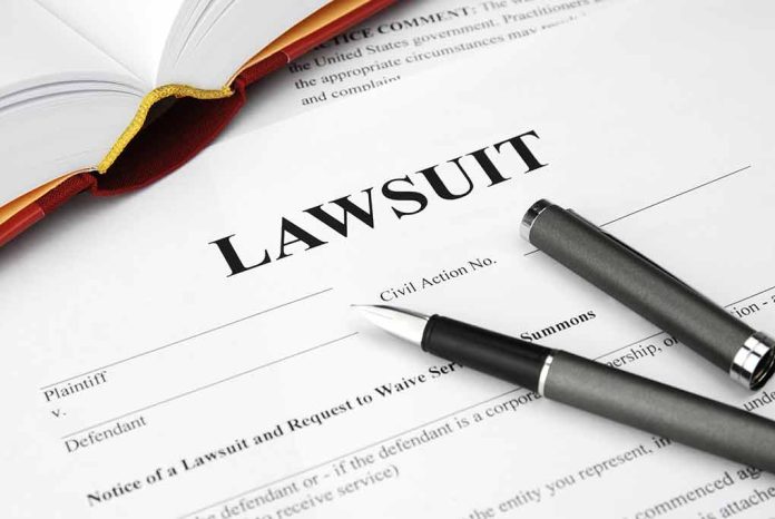 93505339 featured image Legal document titled Lawsuit with pen and book