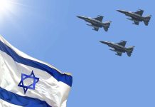 Israeli flag with three fighter jets in flight