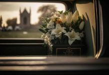 White flowers in a car with blurred background