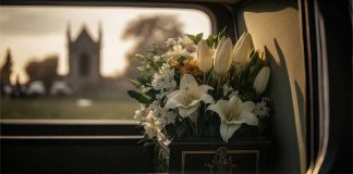 White flowers in a car with blurred background