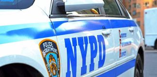 NYPD police car with logo and text