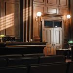 Empty courtroom with judge's bench and wooden decor