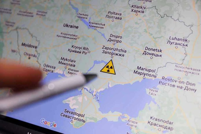 2188181943 Map of Ukraine with nuclear warning symbol