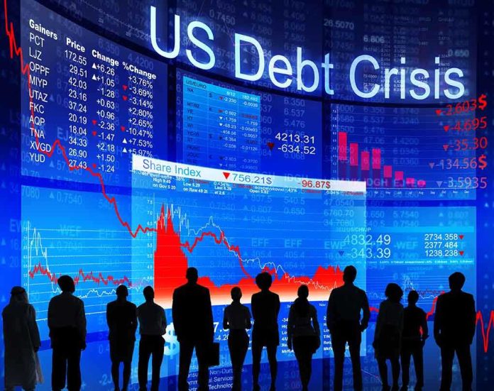 shutterstock_174966974.jpg Silhouettes of business professionals in front of a digital display showing financial data and a US debt crisis