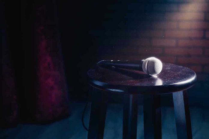 1007889328 Microphone resting on a stool on stage