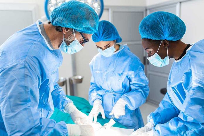 1932544256 Surgeons performing an operation in a sterile environment.