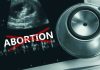 Ultrasound, stethoscope, and "ABORTION" crossed out in red.