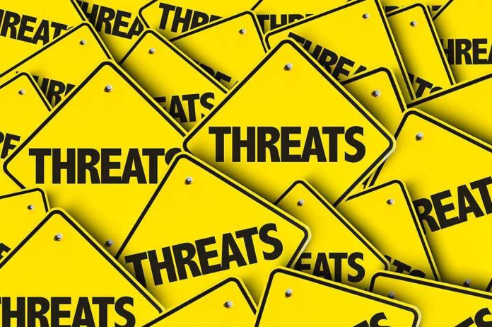 Yellow warning signs with the word "THREATS".