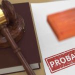 A gavel and a stamped document marked PROBATION
