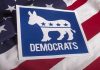 Senator BETRAYS Democrats — Denounces Party! Democrats logo on American flag background