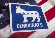 Senator BETRAYS Democrats — Denounces Party! Democrats logo on American flag background