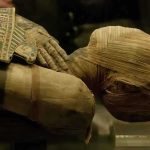 Ancient Monument CRACKS—Collapse Imminent! Close-up of an Egyptian mummy displayed in a museum