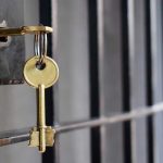 Maxwell’s Prison PRIVILEGES Spark Nationwide Fury Key in lock of prison cell door.