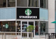 Starbuck Brawls Erupt—Police Rush Stores Starbucks storefront with glass doors and logo