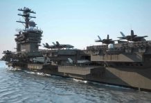 Trump DEPLOYS USS FORD – Where’s It Headed? Aircraft carrier deck with jet planes.