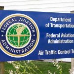Sign for the Federal Aviation Administration at an air traffic control tower