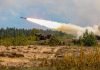 Iranian President’s SHOCKING War Declaration Military tank firing a missile in forest area.