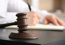 Judge SLASHES Sex Offender Sentence Because RACE Judges gavel on desk with person writing.