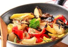 Toxic Cookware INVADES American Kitchens—FDA Warns A skillet filled with colorful stir-fried vegetables including onions and bell peppers