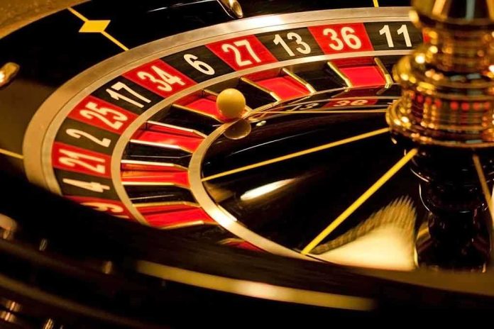 shutterstock_126023555.jpg Close-up of a roulette wheel with a spinning ball