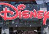 Shocking Price Surge For Disney’s Luxe Sip Bright red Disney logo displayed on a storefront window