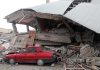 Japan’s First MEGAQUAKE Warning Sparks MASS Panic A red car parked next to a collapsed building with debris scattered around