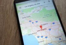 Thieves PLUNGE Los Angeles Into Darkness Smartphone displaying map of Los Angeles, California.