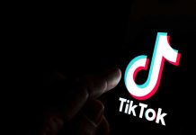 Trans TikTok Persona CRASHES Into Court Finger pointing at TikTok logo on a screen.