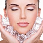 Stunning Therapy DESTROYS Aging Cells A woman with closed eyes holding ice cubes against her face