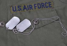 Arizona Democrat ATTACKS Dead Air Force Hero Close-up of a U.S. Air Force uniform with dog tags