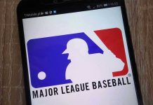 BRUTAL Tax Reality Flips MLB Free Agency Major League Baseball logo on a smartphone screen.