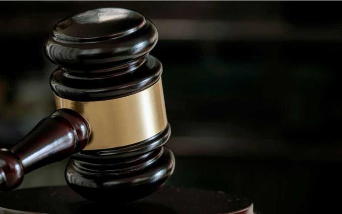 1707837892 Close-up of a judges gavel.