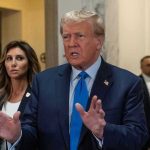 TRUMP Commissioner ATTACKS Jewish Witnesses Man speaking with hands raised, woman and security behind.