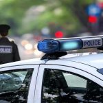 LAPD Cop Skydives on Tax-Free Disability Police car and officer on a city street.