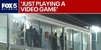 Teen killed by bullet through motel wall; arrest made