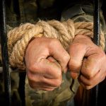 Ransom Note LEAKED — Kidnappers’ Fatal Error Exposed Hands tied with rope gripping prison bars