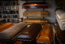 Showroom with coffins and urns.