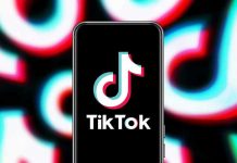 $10M Smackdown Hits TikTok “Psychic” TikTok app logo on a smartphone screen.